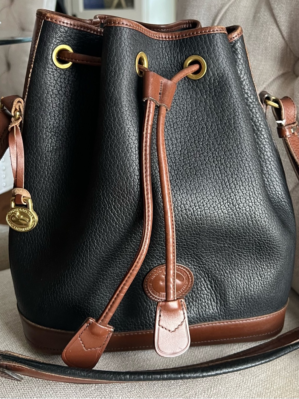 Dooney & Bourke Vintage Navy Blue/Tan Pebbled Leather Drawstring Bucket Bag